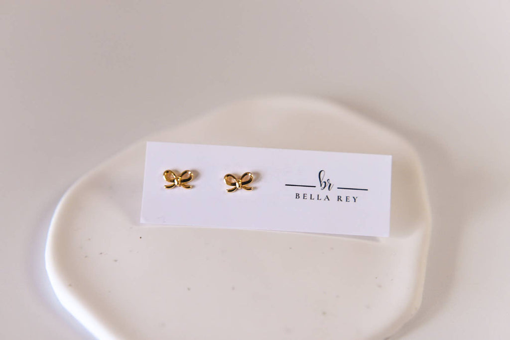 The Lela Dainty Gold Bow Stud Earrings