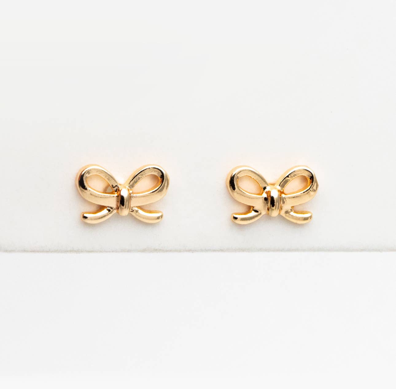 The Lela Dainty Gold Bow Stud Earrings